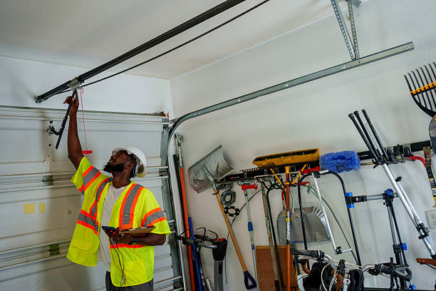 Professional Garage Door Panel Replacement technician working in Manteo, NC